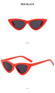 Front and side view of trendy red cat-eye sunglasses for kids with dark lenses
