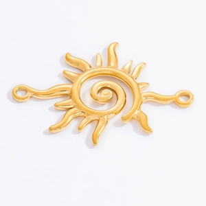 Macro shot of 18k gold plated sun charm pendant with spiral pattern for DIY jewelry