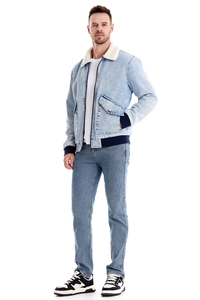 Detail of men's fleece denim jacket featuring white faux fur collar and zipper closure