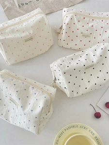 Striped heart makeup bags in four colors with secure top zipper and spacious design