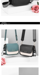 Detail view of stylish square crossbody bags with wide woven straps and bear charms
