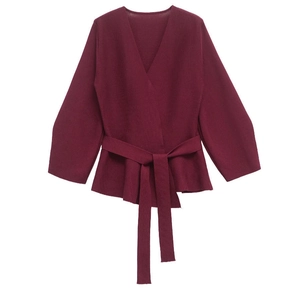 Maroon wrap knit sweater with long sleeves, v-neckline and matching waist belt tie