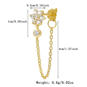 Detail of silver flower stud earring with zircon pendant and 4cm golden chain drop