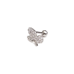 Macro shot of silver butterfly stud earring with sparkling cubic zirconia and screw back