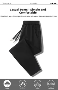 Close-up of men's athletic pants with elastic drawstring waist and zipper pocket details