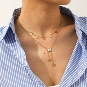 Double-layered gold necklace with butterfly pendants and Y-shaped tassel for women