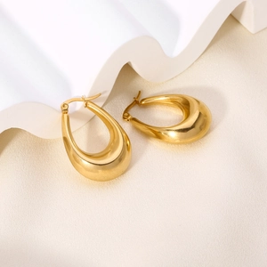 French vintage style chunky gold teardrop hoop earrings in polished stainless steel