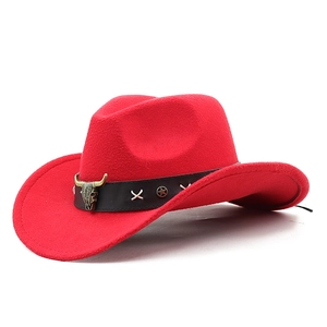 Red western cowboy felt hat featuring a bull head metal buckle and vintage leather band