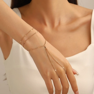 Elegant gold multi-layer finger bracelet with delicate sequins and fine chains for women
