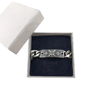Silver square tag bracelet with star engraving in a premium gift box presentation