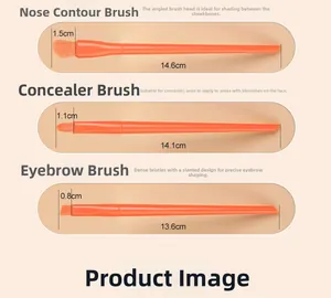 Detail view of orange makeup brushes including nose shadow, concealer, and eyebrow tools