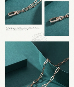 Detail of rose gold double-layer paperclip necklace with micro-pave diamond accents