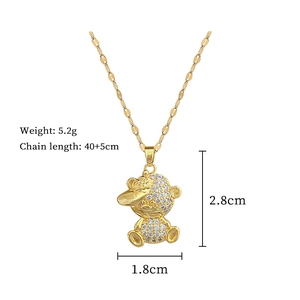 Detail view of gold boy pendant necklace showing size dimensions and weight info