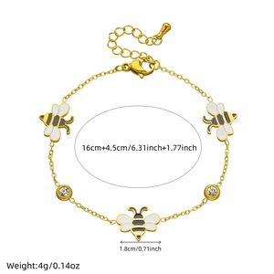 Gold-plated stainless steel bee bracelet with white enamel charm and cubic zirconia