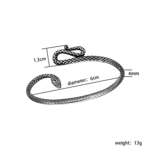 Silver vintage snake bracelet with dimensions 6cm diameter and 13g weight on white background