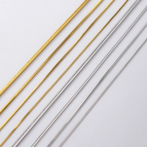 Polished 18K gold and silver stainless steel snake bone chain necklaces in various widths