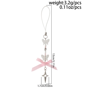 Detail view of bow keychain with dimensions 13cm long and star charm pendant