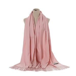 Soft solid color faux cashmere scarf for women, warm winter fringe shawl with label detail.