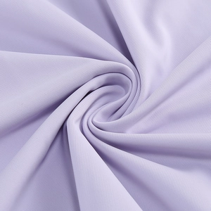 Macro shot of light purple high-elastic fabric with elegant spiral draping texture
