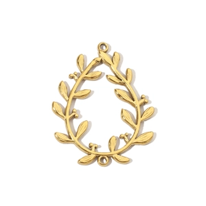 Detailed view of a golden teardrop leaf pendant with dual holes for jewelry making