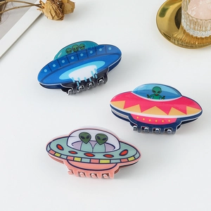 Creative UFO alien hair claws in acrylic material featuring unique starship designs
