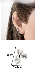 Detail view of pink bunny earring with dimensions 1.08cm by 0.44cm and clear zircon stone