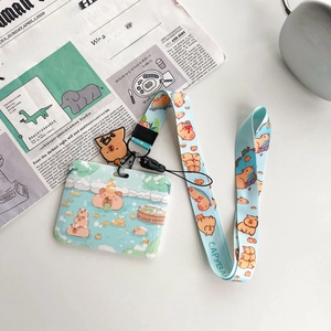 Detail of light blue Capybara ID card holder set with matching printed lanyard