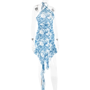 Detail of blue tie-dye halter dress featuring side ruching and asymmetric ruffle hem