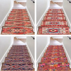 Detail of vintage Persian style non-slip stair treads in four different ethnic patterns