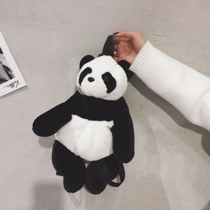Plush panda cartoon backpack with adjustable straps shown from a top-down view