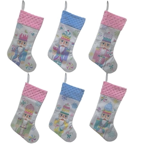 Set of 6 colorful nutcracker Christmas stockings in pink and blue for holiday tree decor