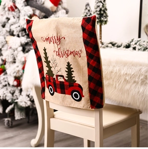 Linen Christmas chair cover featuring red truck and Merry Christmas text decor