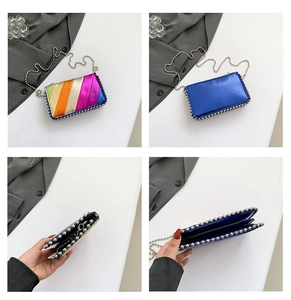 Detail of multi-compartment mini chain bag with metallic beads and rainbow stripe texture