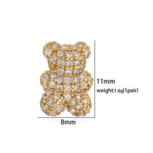 Detail view of gold teddy bear earrings with cubic zirconia, size 11mm by 8mm
