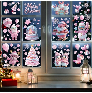 Pink and white Christmas window clings featuring Santa and reindeer on glass pane