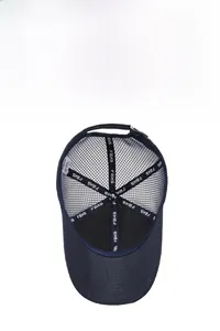 Detail of dark blue mesh baseball cap showing breathable holes and inner FBXS lining
