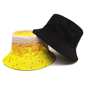 Two-piece bucket hat set featuring classic solid black and creative yellow beer foam print