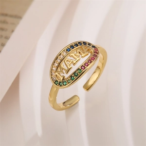 Macro shot of MAMA open ring with colorful zircon stones and premium gold finish
