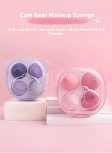 Detailed view of soft purple and pink beauty blenders in cute bear-shaped storage boxes