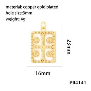 Detail view of gold-plated copper Saint Benedict cross pendant with dimension specs