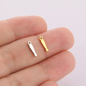 Macro view of gold and silver hexagram charm pendants for DIY jewelry making