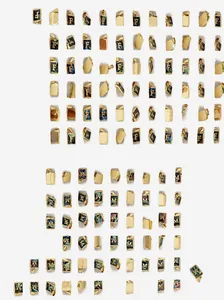 Bulk display of square golden stainless steel pendants with shell alphabet inlay details