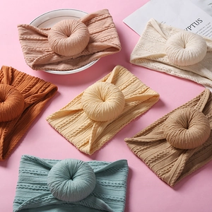 Soft nylon baby donut headbands in six pastel colors including pink and blue