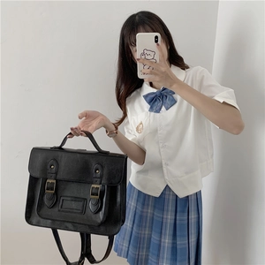 Sac à dos d'école vintage noir en cuir classique sac à bandoulière polyvalent pour femmes.