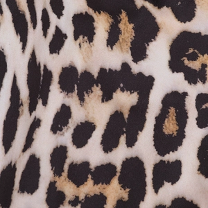 Detailed macro view showing the high-quality leopard print fabric texture and textile fibers