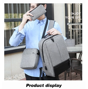 Three-piece men's business backpack set with shoulder bag and clutch in grey Oxford fabric