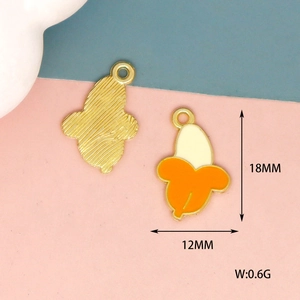 Detailed macro view showing dimensions and texture of banana alloy charms for DIY jewelry