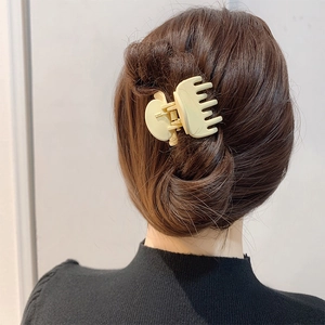 Matte beige hair claw clip for high ponytail styling on brunette hair back view