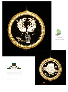 Close-up of 3D acrylic LED Christmas hanging lights with reindeer and bell patterns