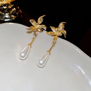 French vintage gold plated flower earrings with elegant teardrop pearls for women